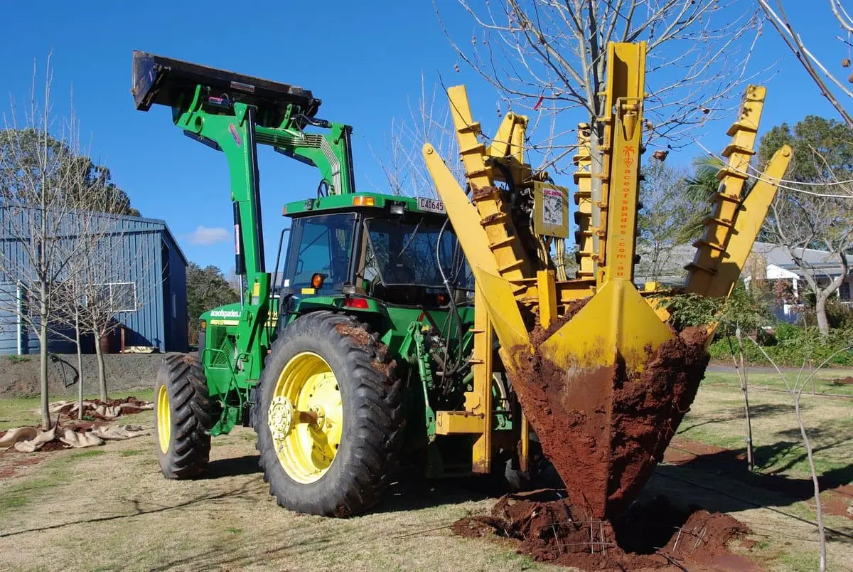 Tree spades used in modern landscaping projects